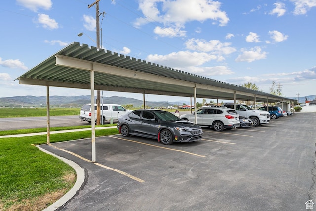 595 S Main St Unit 26, Kamas, UT 84036 - covered parking lot featuring a mountain view