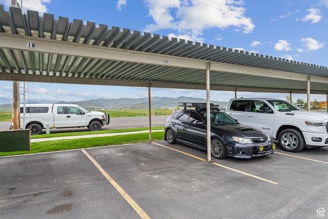 595 S Main St Unit 26, Kamas, UT 84036 - covered parking lot featuring a mountain view