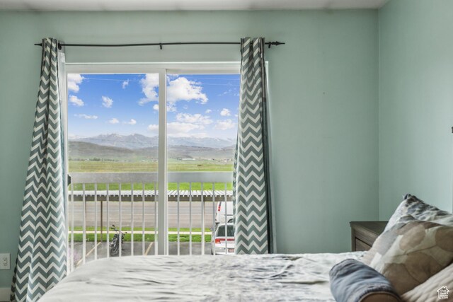 595 S Main St Unit 26, Kamas, UT 84036 - bedroom with access to exterior and a mountain view