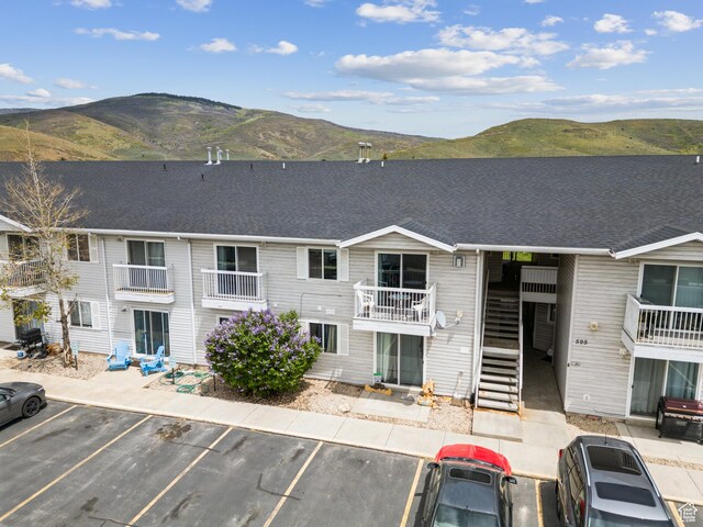 595 S Main St Unit 26, Kamas, UT 84036 - view of property featuring a mountain view and uncovered parking