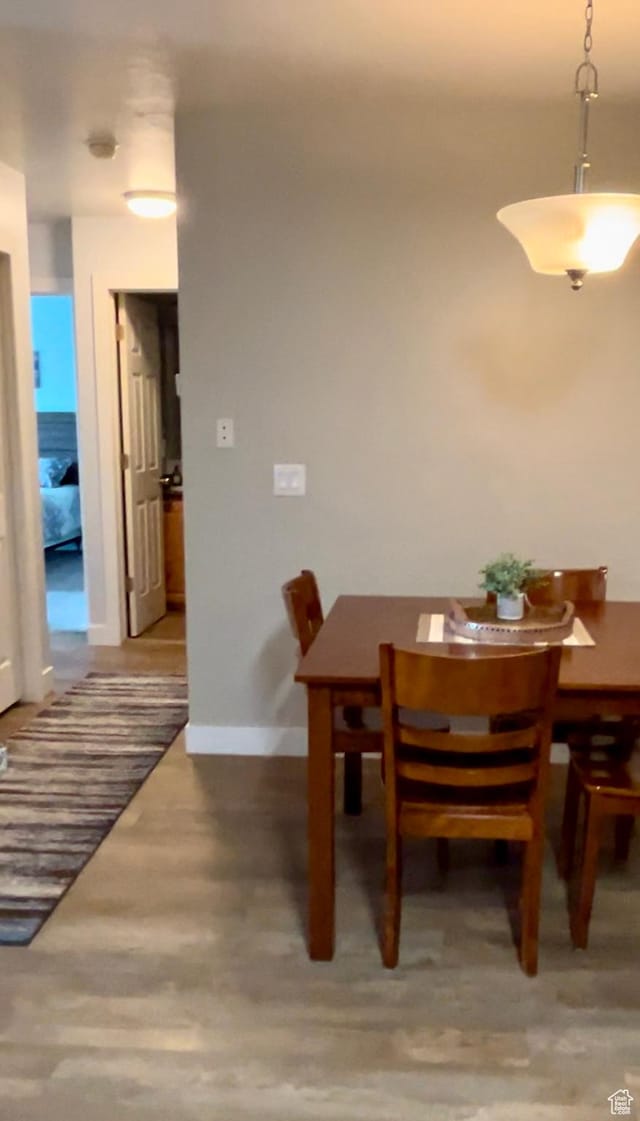 595 S Main St Unit 26, Kamas, UT 84036 - dining area with wood finished floors and baseboards