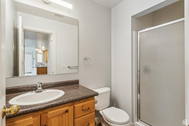 595 S Main St Unit 26, Kamas, UT 84036 - full bathroom featuring a stall shower, vanity, and toilet