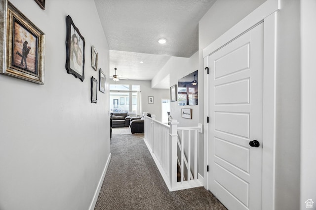 1228 N 100 E, Nephi, UT 84648 - corridor with carpet floors, an upstairs landing, baseboards, a textured ceiling, and recessed lighting