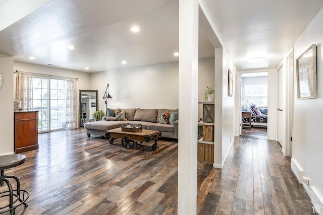 4097 S 670 E Unit C, Murray, UT 84107 - living area with dark wood finished floors, recessed lighting, and baseboards