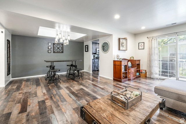 4097 S 670 E Unit C, Murray, UT 84107 - living area featuring hardwood / wood-style floors, recessed lighting, baseboards, and a chandelier