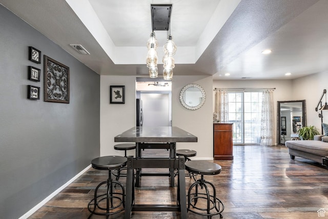 4097 S 670 E Unit C, Murray, UT 84107 - dining area with baseboards, dark wood-type flooring, a raised ceiling, and recessed lighting