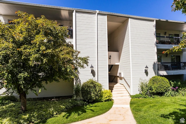 4097 S 670 E Unit C, Murray, UT 84107 - entrance to property featuring a lawn