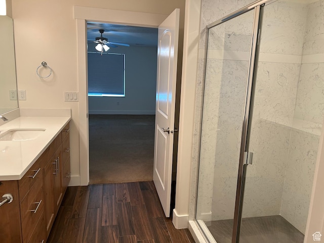 1224 S Grace Way, Layton, UT 84041 - full bathroom featuring vanity, a ceiling fan, a stall shower, and wood finished floors