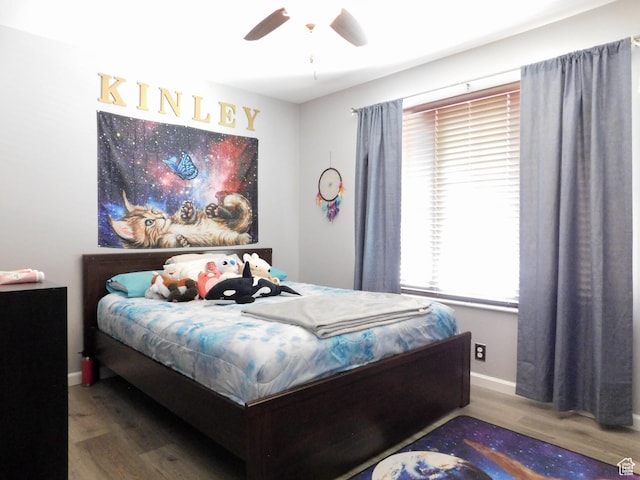 9467 S 250 E, Sandy, UT 84070 - bedroom with wood finished floors, baseboards, and a ceiling fan