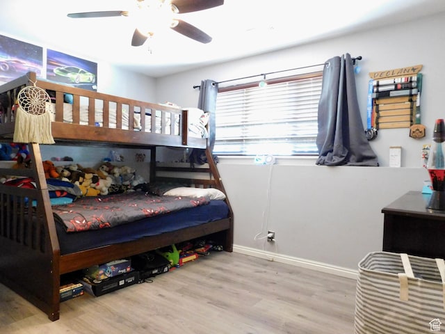 9467 S 250 E, Sandy, UT 84070 - bedroom with wood finished floors, a ceiling fan, and baseboards