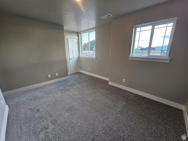 454 N 500 E Lot 3, Salem, UT 84653 - spare room featuring a textured ceiling, baseboards, and dark carpet