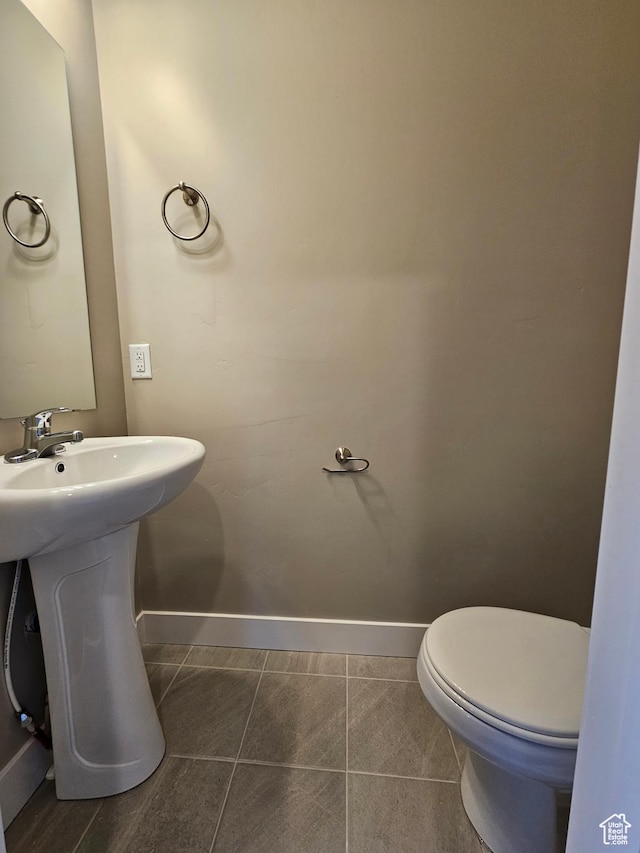 454 N 500 E Lot 3, Salem, UT 84653 - half bathroom with baseboards, toilet, a sink, and tile patterned floors