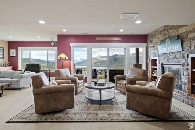 10371 N Sightline Cir, Hideout, UT 84036 - living room with carpet floors, a fireplace, and recessed lighting