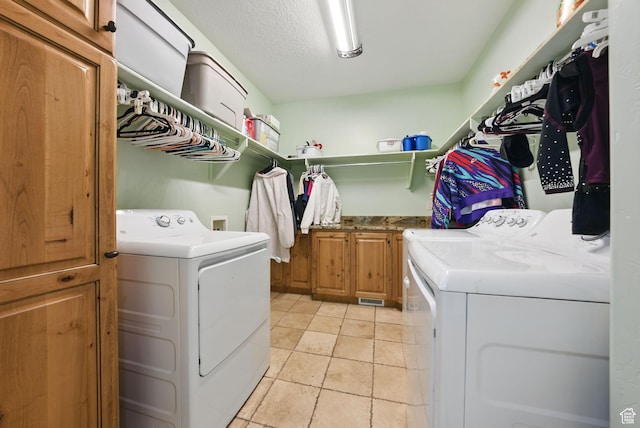 62 W 225 N, Lindon, UT 84042 - laundry room with washing machine and clothes dryer, cabinet space, and light tile patterned flooring