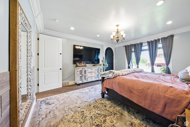 62 W 225 N, Lindon, UT 84042 - bedroom featuring ornamental molding, a chandelier, baseboards, carpet, and arched walkways