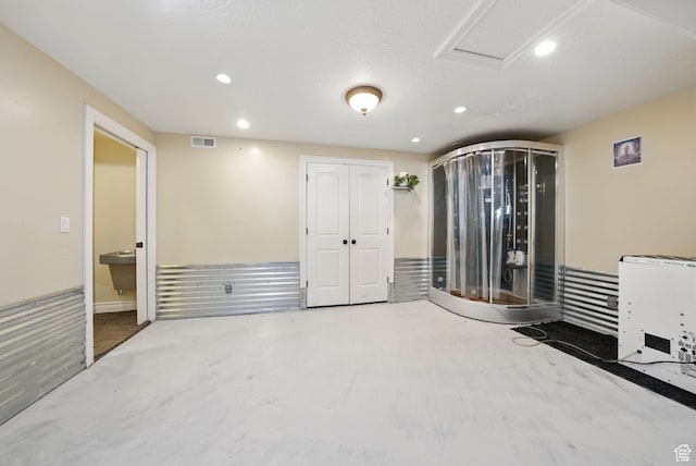 62 W 225 N, Lindon, UT 84042 - unfurnished bedroom with concrete floors, recessed lighting, heating unit, and a closet