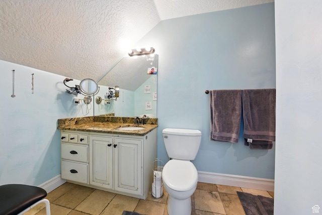 62 W 225 N, Lindon, UT 84042 - bathroom featuring vaulted ceiling, a textured ceiling, baseboards, toilet, and vanity