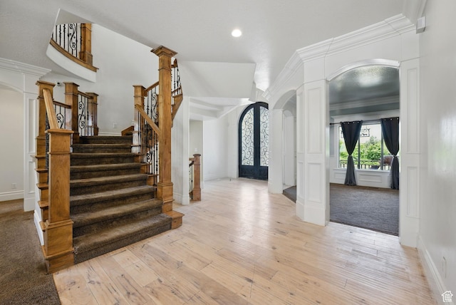 62 W 225 N, Lindon, UT 84042 - entryway featuring decorative columns, arched walkways, light wood-type flooring, stairs, and recessed lighting
