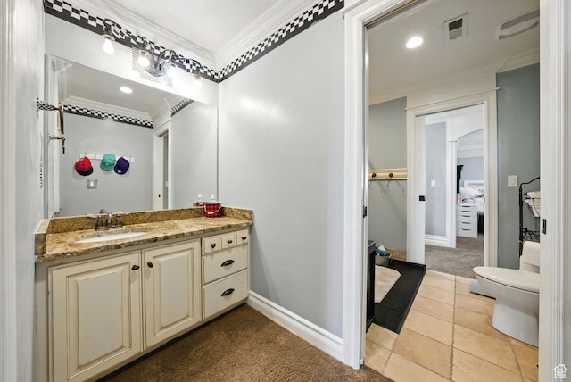 62 W 225 N, Lindon, UT 84042 - bathroom featuring crown molding, vanity, baseboards, toilet, and a spacious closet