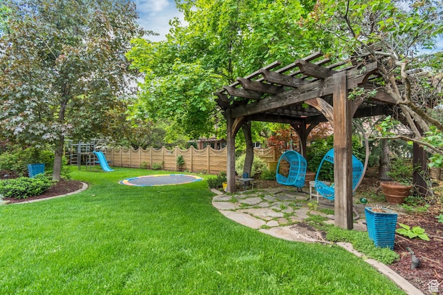 11198 S Wyngate Ln E, Sandy, UT 84092 - view of yard featuring a pergola and a playground