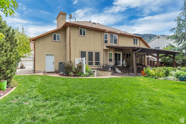 11198 S Wyngate Ln E, Sandy, UT 84092 - back of house with a patio, a chimney, stucco siding, and central AC unit