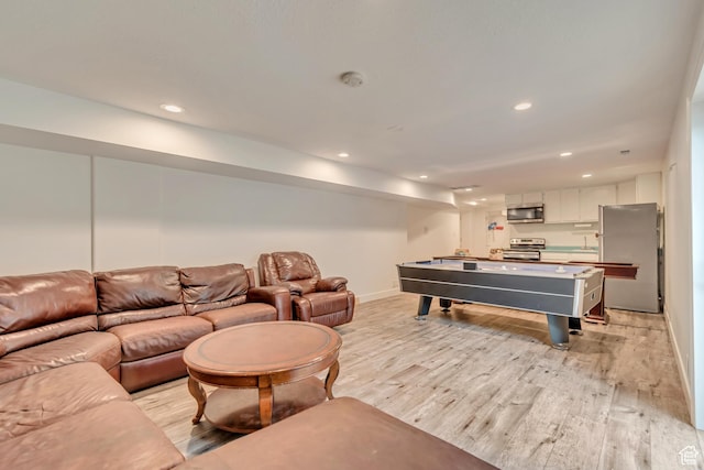 11198 S Wyngate Ln E, Sandy, UT 84092 - recreation room featuring light wood-style floors, baseboards, and recessed lighting