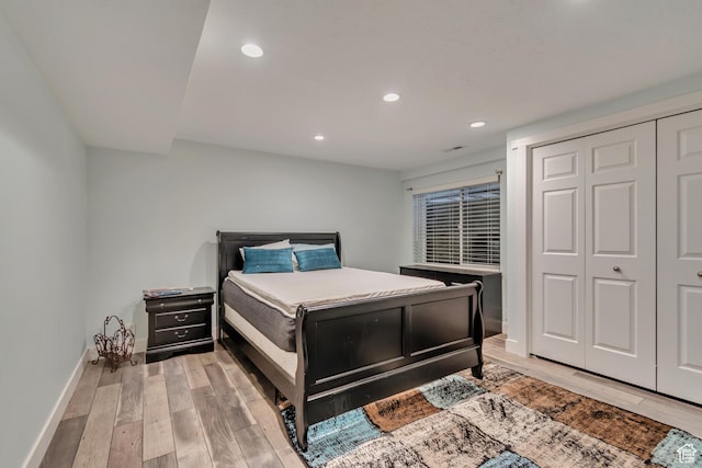 11198 S Wyngate Ln E, Sandy, UT 84092 - bedroom featuring recessed lighting, light wood finished floors, baseboards, and a closet