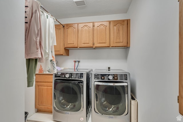 11198 S Wyngate Ln E, Sandy, UT 84092 - laundry area with washer and clothes dryer and cabinet space