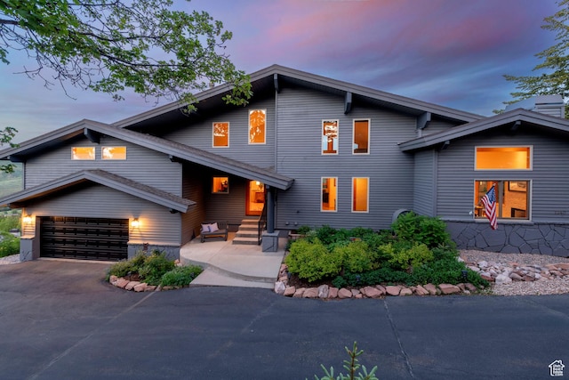 7340 Buckboard Dr N, Park City, UT 84098 - view of front of house featuring driveway, entry steps, and an attached garage