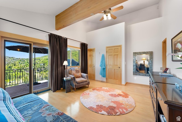 7340 Buckboard Dr N, Park City, UT 84098 - bedroom with access to outside, a high ceiling, light wood finished floors, and baseboards
