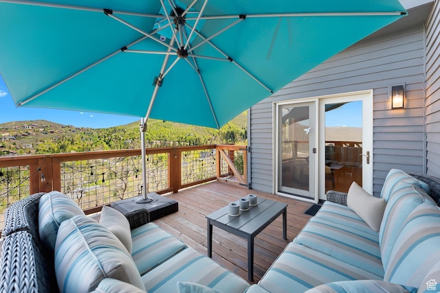 7340 Buckboard Dr N, Park City, UT 84098 - wooden deck featuring an outdoor hangout area