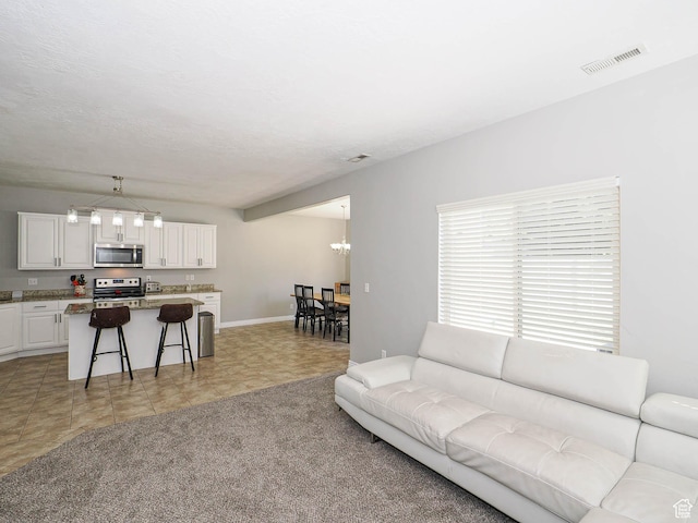 385 E 570 S, American Fork, UT 84003 - living area with a chandelier and baseboards