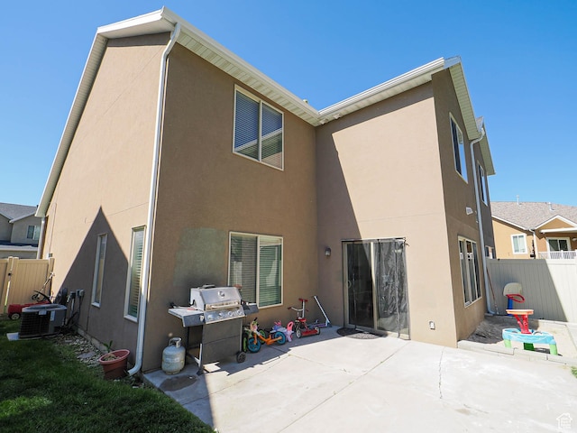 385 E 570 S, American Fork, UT 84003 - rear view of property featuring a patio area, stucco siding, and central air condition unit