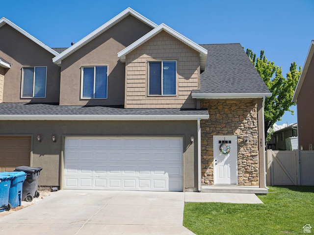 385 E 570 S, American Fork, UT 84003 - view of front of property with driveway, stone siding, a garage, and a shingled roof