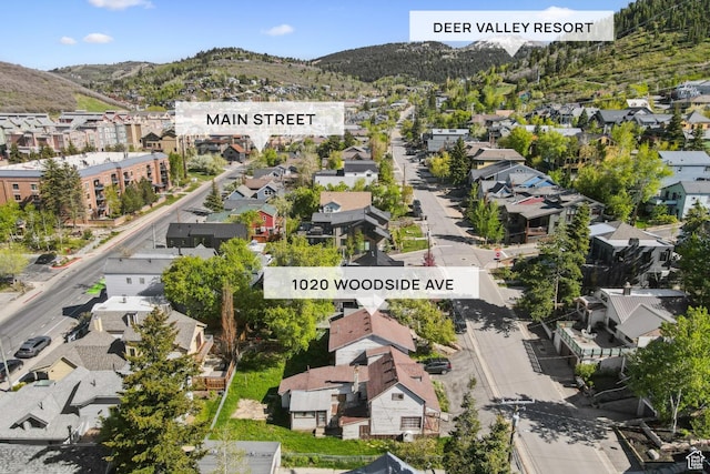 1020 Woodside Ave, Park City, UT 84060 - aerial view of property and surrounding area featuring a mountain backdrop and nearby suburban area