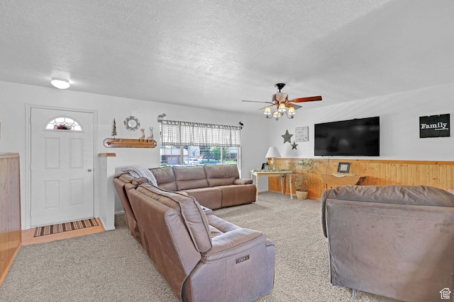3966 W 2200 N, Plain City, UT 84404 - living area with carpet flooring, a textured ceiling, and ceiling fan