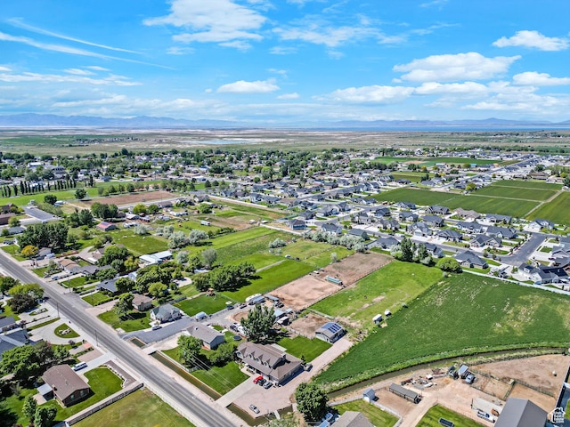 3966 W 2200 N, Plain City, UT 84404 - aerial view of residential area featuring a mountain backdrop