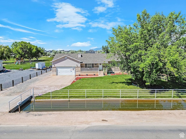 3966 W 2200 N, Plain City, UT 84404 - view of front facade featuring driveway and an attached garage