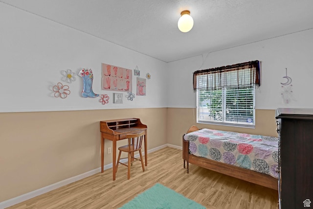 3966 W 2200 N, Plain City, UT 84404 - bedroom featuring wood finished floors and baseboards