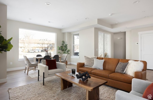 1562 E 3900 S Unit 106, Millcreek, UT 84124 - living room featuring baseboards, wood finished floors, plenty of natural light, and recessed lighting