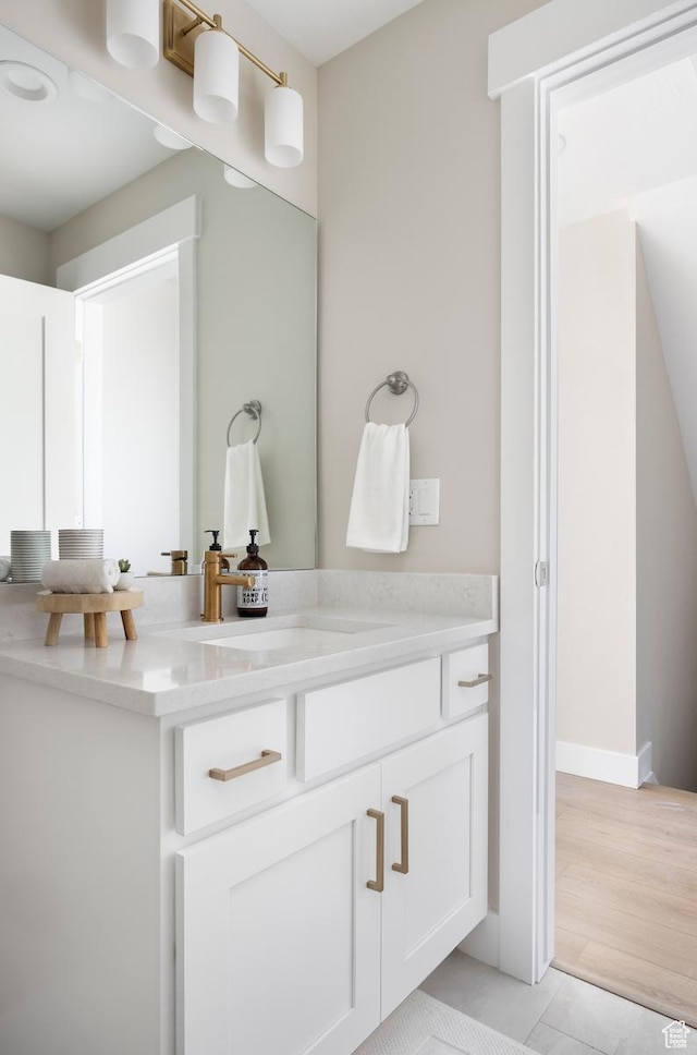 1562 E 3900 S Unit 106, Millcreek, UT 84124 - bathroom with vanity, tile patterned flooring, and baseboards