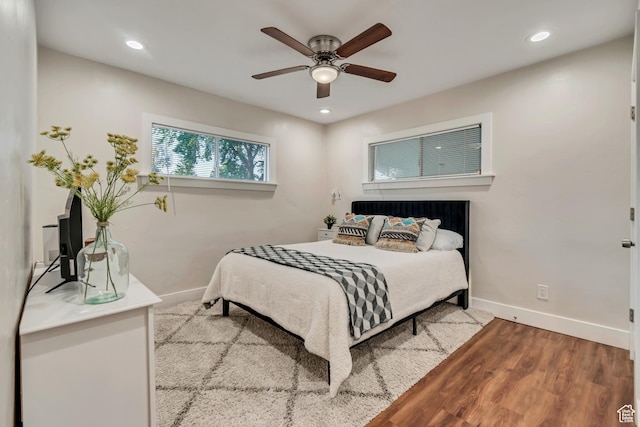 2867 S Cyprus Ln, Magna, UT 84044 - bedroom featuring baseboards, wood finished floors, a ceiling fan, and recessed lighting
