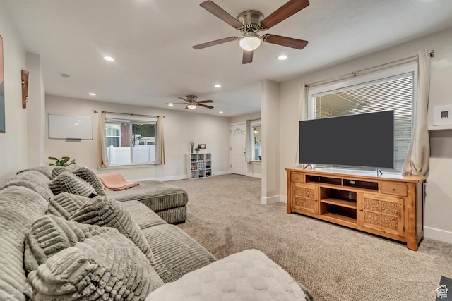 2867 S Cyprus Ln, Magna, UT 84044 - carpeted living area featuring a ceiling fan, baseboards, recessed lighting, and plenty of natural light