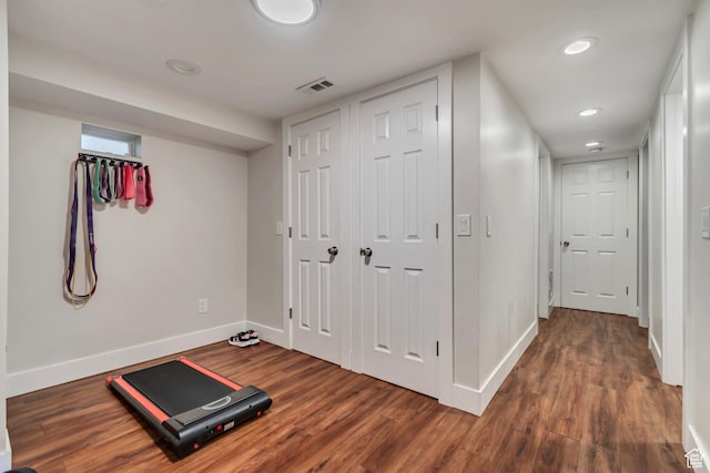 2867 S Cyprus Ln, Magna, UT 84044 - exercise area featuring baseboards, wood finished floors, and recessed lighting