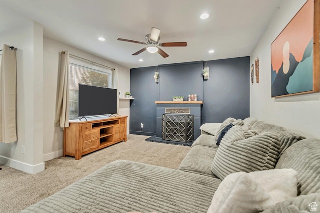 2867 S Cyprus Ln, Magna, UT 84044 - carpeted living room with a ceiling fan, recessed lighting, baseboards, and a fireplace with raised hearth