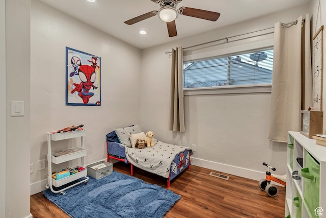 2867 S Cyprus Ln, Magna, UT 84044 - bedroom with wood finished floors, recessed lighting, baseboards, and a ceiling fan
