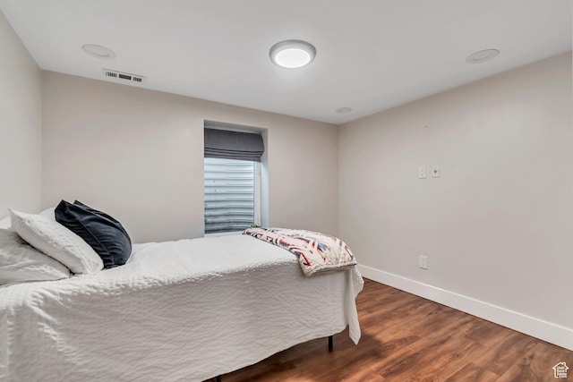 2867 S Cyprus Ln, Magna, UT 84044 - bedroom with baseboards and dark wood finished floors