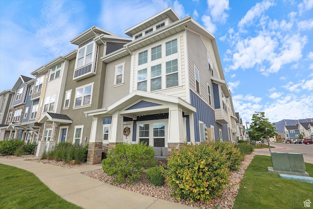 702 E 330 N, Vineyard, UT 84059 - view of front of property with a residential view and stone siding