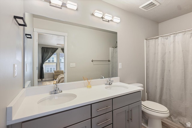 702 E 330 N, Vineyard, UT 84059 - full bathroom with double vanity, toilet, and a shower with curtain