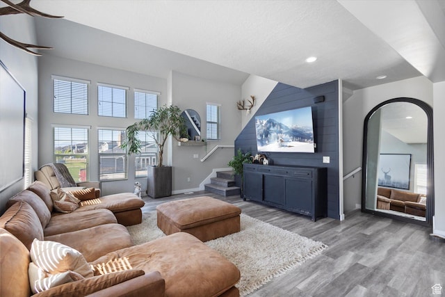 702 E 330 N, Vineyard, UT 84059 - living area featuring light wood finished floors, baseboards, healthy amount of natural light, recessed lighting, and stairs